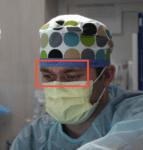Image showing face detection for a subject wearing a mask and a medical cap.